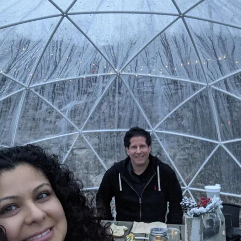 Celebrating Michael’s 42nd birthday in a plastic dome.