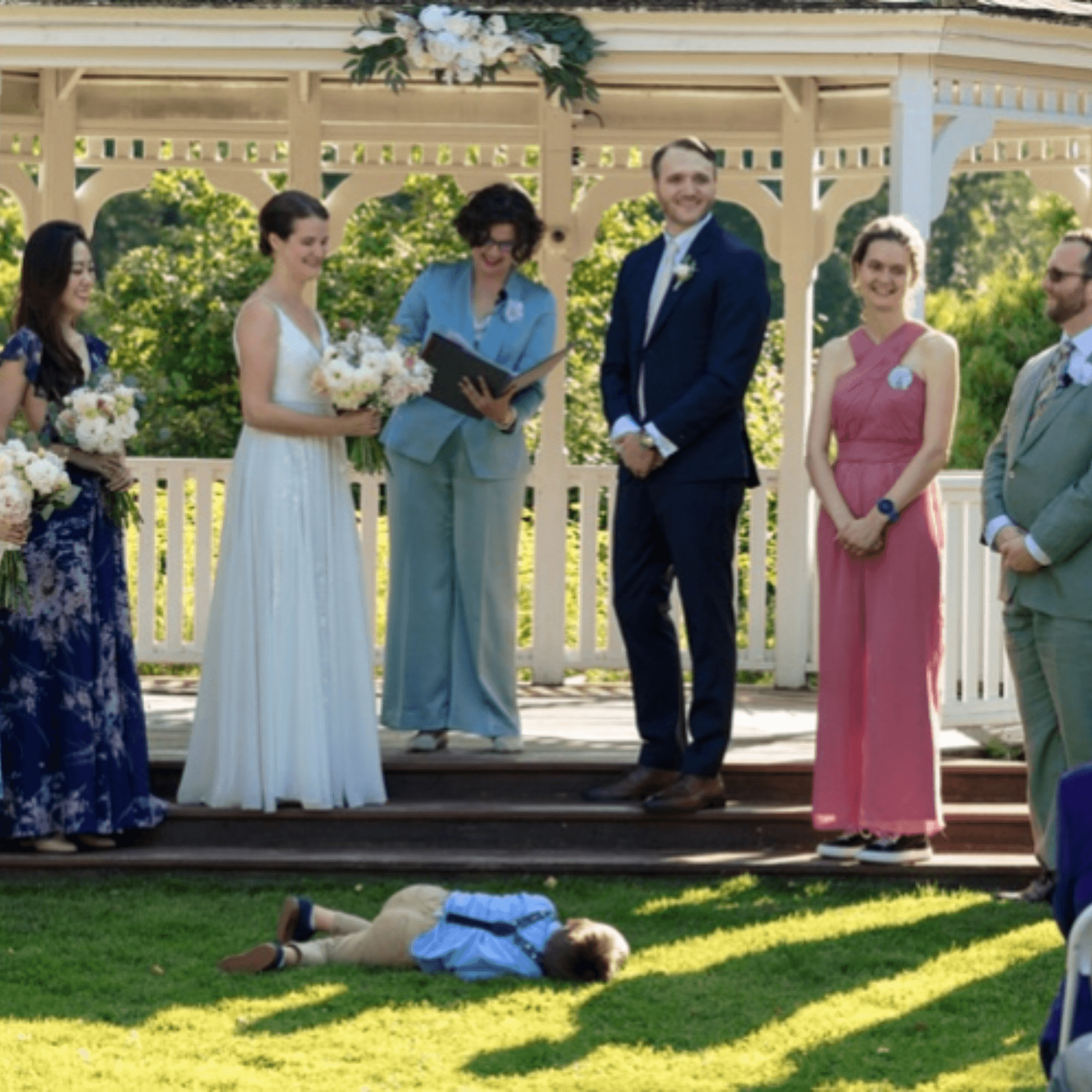 officiating my best friend's wedding. Once the ring bearer was done with his job he decided to chill out right up front!