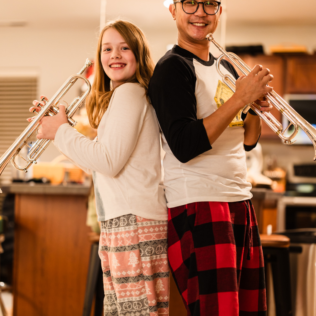 trumpets and pajamas! Carl and our god daughter both play trumpet
