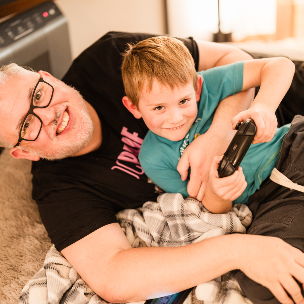 Jon and our god son playing video games